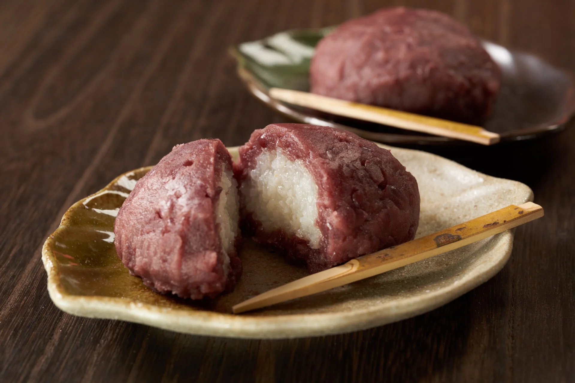 Botamochi is a wagashi (Japanese confection) made with glutinous rice, white rice, and sweet azuki paste (red bean paste).